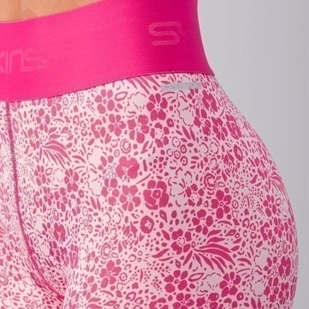 SKINS Pro Performance DNAmic Primary Compression Tights Floral gently preloved - Picture 13 of 14
